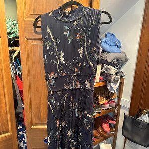 Navy Blue Floral, sleeveless dress with mock collar.